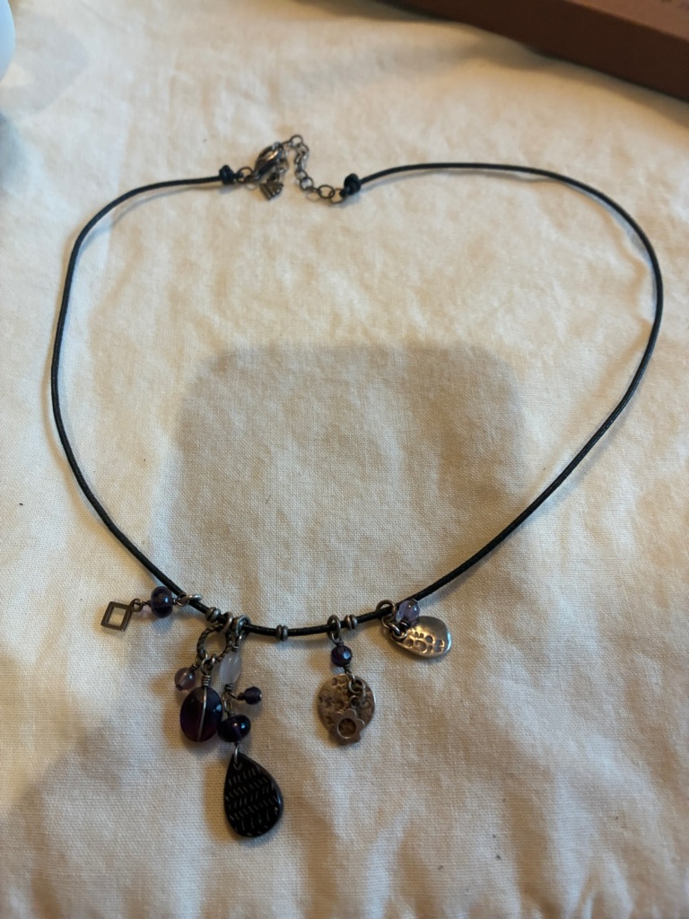 Silpada amethyst and silver Charm  Necklace in Purple, silver and Black.N1788